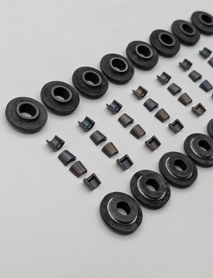 Steel retainers and split cones for cylinder head valves to one groove